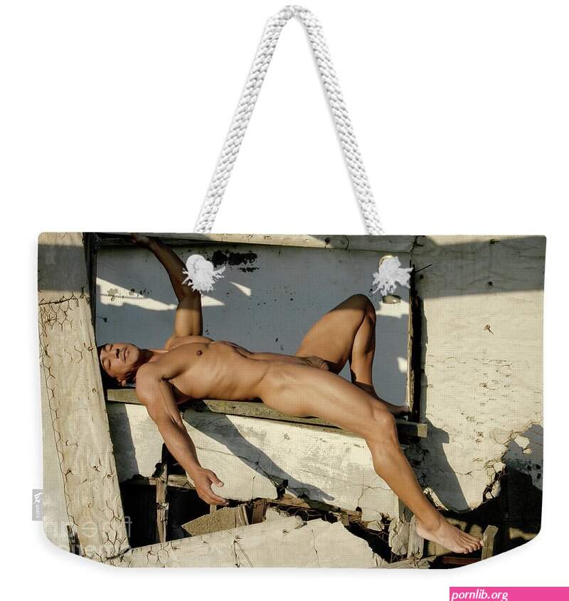 Naked male model lays on broken down window seal Weekender Tote Bag by Gunther Allen