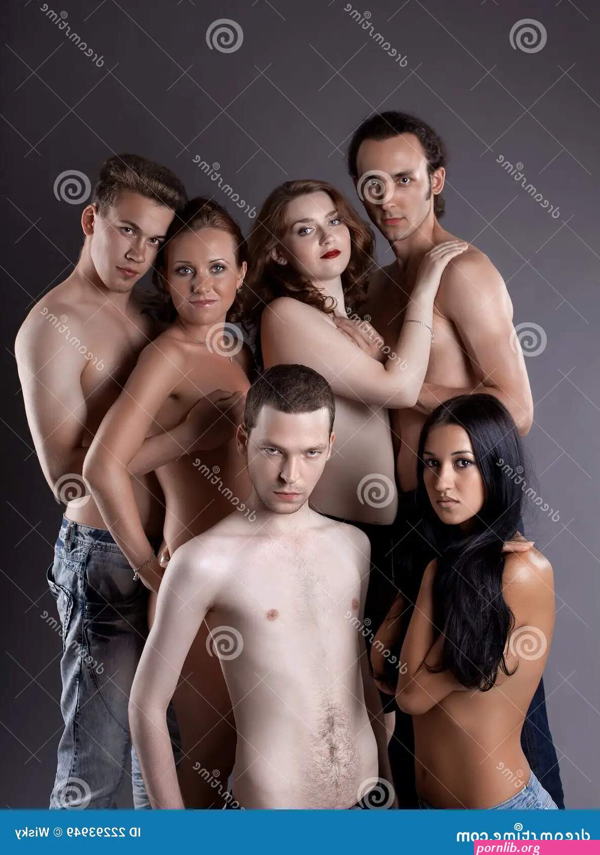 Group of Young Nude People Posing in Jeans Stock Image