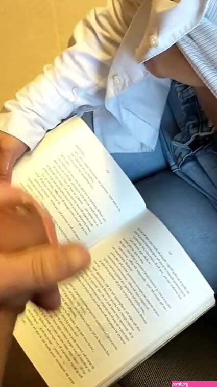 Blowjob in a library cum on a book