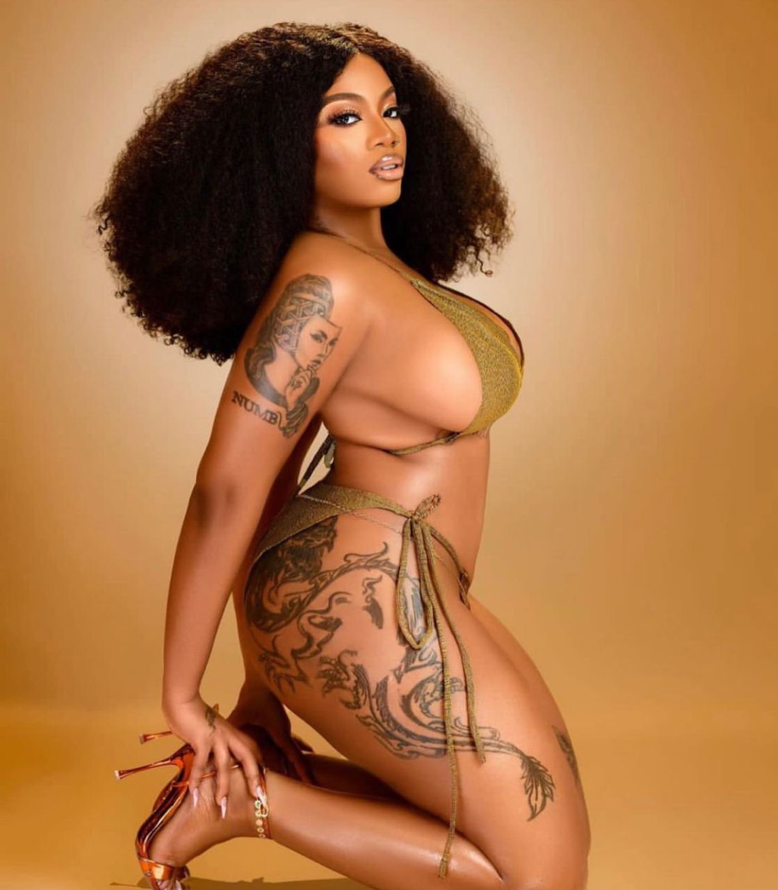 BBNaijas Angel flashes her boobs and butt in sexy bikini photo