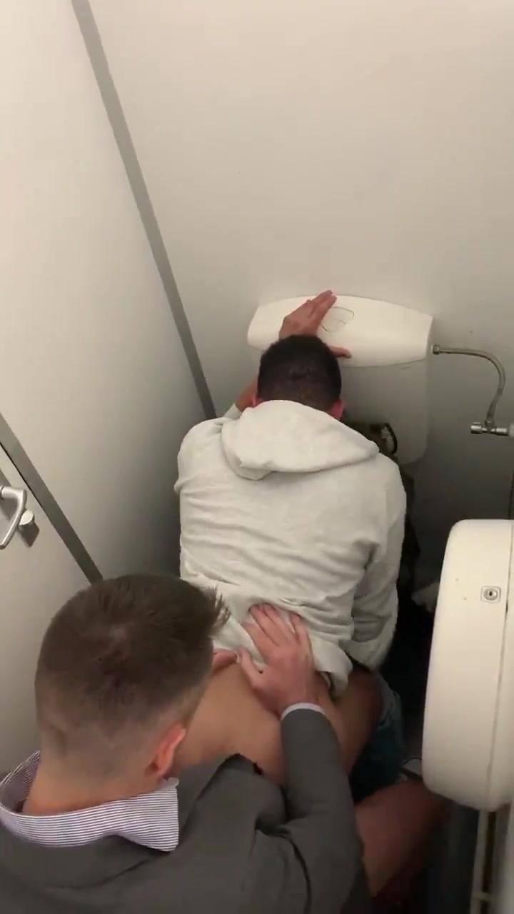 Suited fuck in airplane bathroom