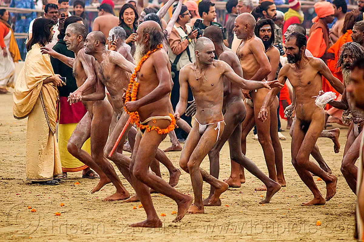 Naked Hindu Devotees Running after Holy Dip