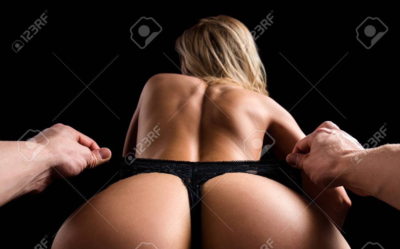 Sexy Couple. Sensual Erotic Woman Stripper With Big Ass Buttocks. Woman Is About To Pull Off Her Panties. Stock Photo Picture and Royalty Free Image. Image 154847636.