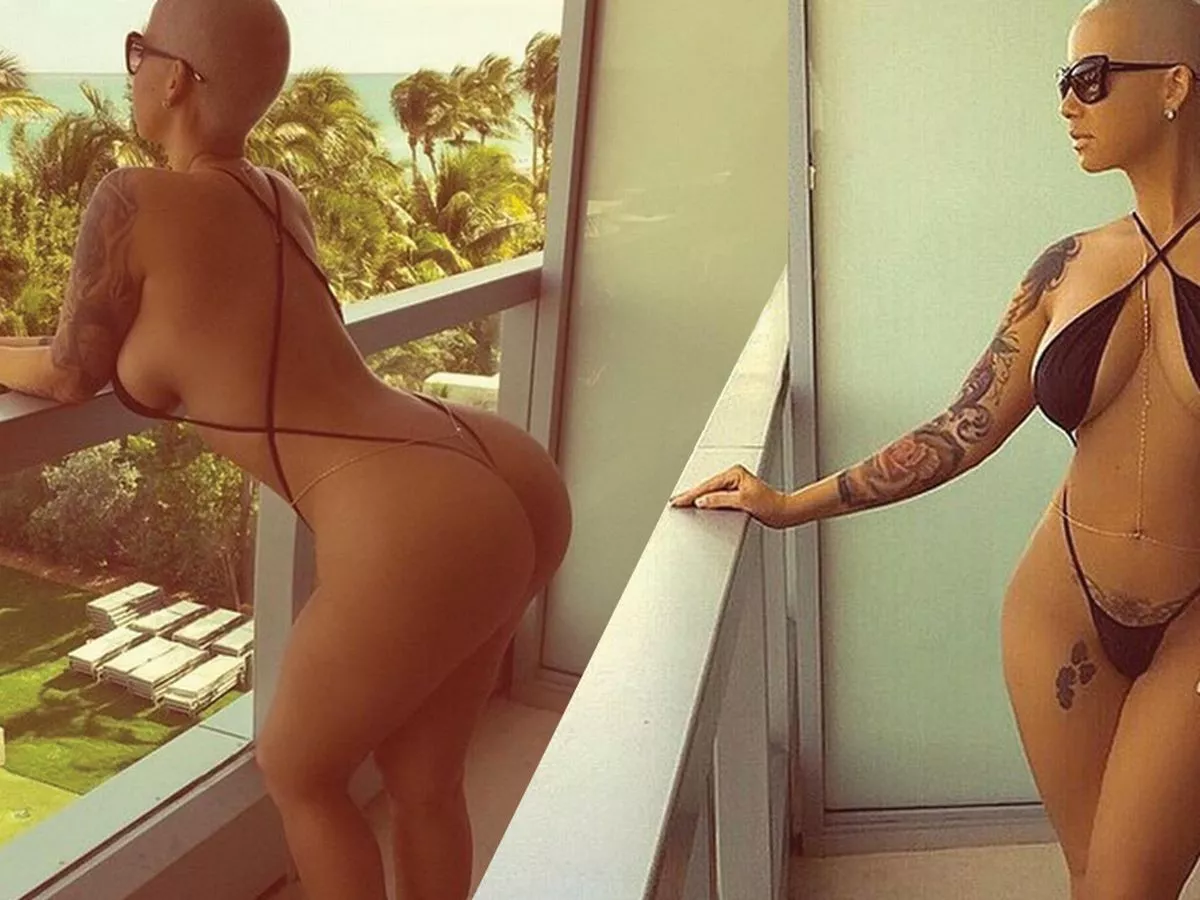 Amber Rose poses in TINY monokini and flashes her booty while calling herself a MILF
