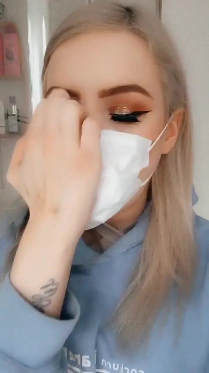 Blonde shoves dildo down throat and puts over facemask