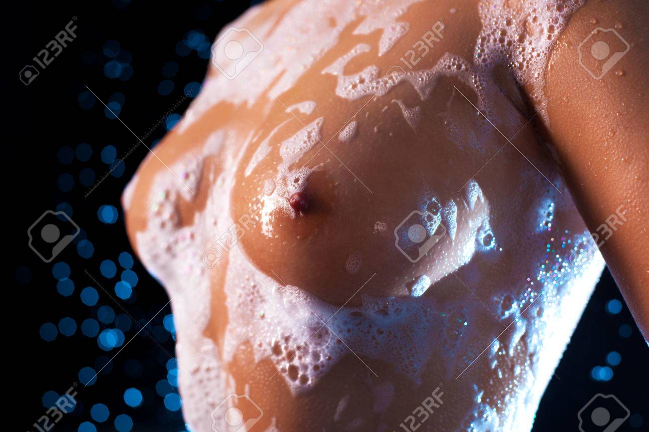 Young Woman Wet Breast With Soap. Stock Photo Picture and Royalty Free Image. Image 24293206.