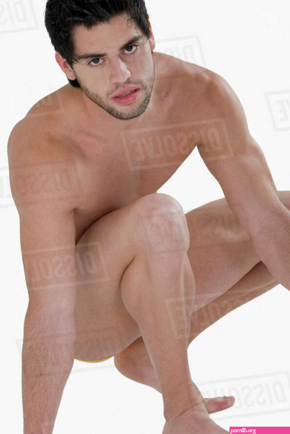 Nude Hispanic man crouching